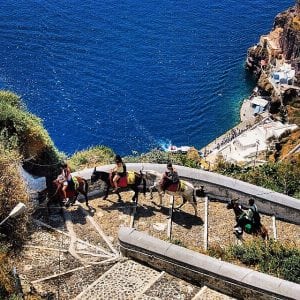 riding donkeys Santorini, Greece
