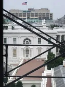 Looking out at the construction of the Eisenhower Executive Office Building and the West Wing