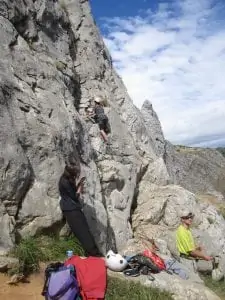rock climbing before bull chase in Spain