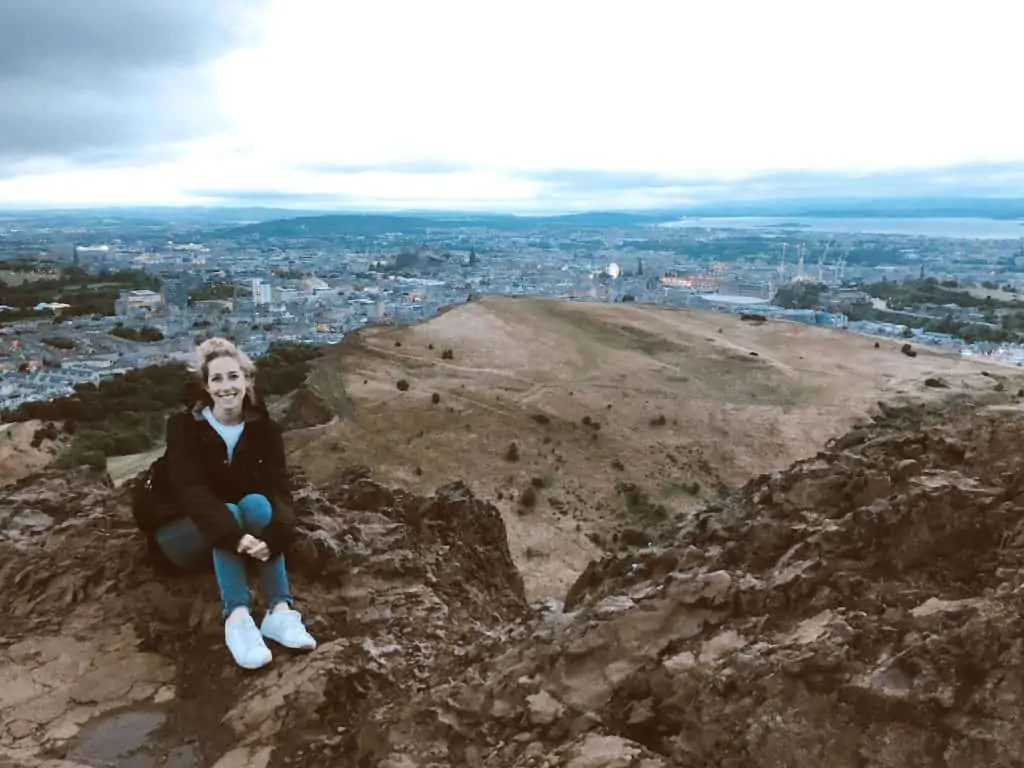 hiking arthurs seat in comfortable white sneakers